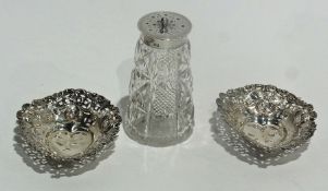 A pair of silver oval bonbon dishes of pierced fretwork design, together with a cut glass sugar