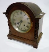 "John Bull & Co., Bedford" oak mantel clock, in broken arched top case, with spirally turned