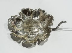 A Continental silver leaf dish with stem handle