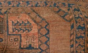 Two various old eastern wool rugs, geometric designs