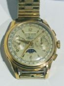 An Ansa Swiss chronometer wrist watch, multi dial stop watch, with moon face, gold case with