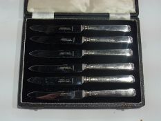 A set of six silver handled tea knives by Garrard & Co., London 1929, cased