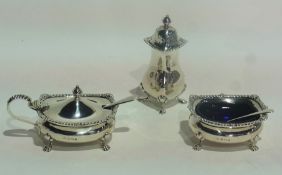 A silver three piece cruet set with foliate gadrooned borders, raised on paw feet comprising