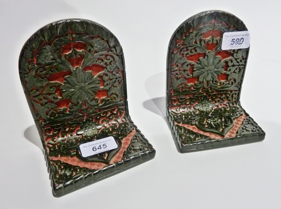 Pair oriental carved hardstone bookends, pierced with foliate design, with red ground (2)