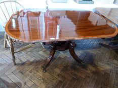 Georgian mahogany supper table, on turned support and fluted splayed legs, on castors, 137cm wide