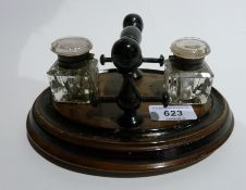 Victorian stained wood inkstand with turned handle, fitted two glass wells and a quantity lace