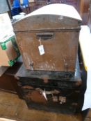 Large metal bound black trunk, with labels, and tin trunk