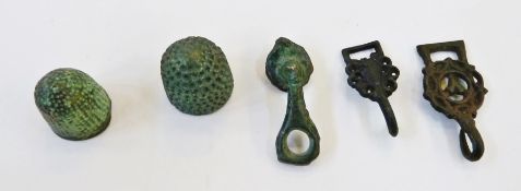 Two medieval bronze beehive thimbles, Celtic period bronze clothes toggle and two Tudor period dress