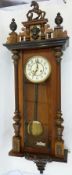 Nineteenth century Vienna Regulator style walnut and stained wood wall clock, with horse, mask and