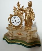 French style alabaster and gilt metal mantel clock, drum-shaped movement surmounted by oak