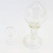 Reproduction glass lace maker's lamp, having bulbous bowl, with flat knop tapered column, ogee foot,