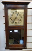 Twentieth century stained wood wall clock, with glazed door, with channelled case, ogee mould