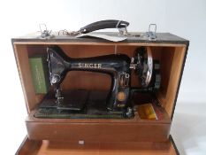 Singer sewing machine in case