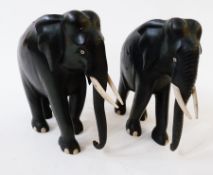 Pair of ebony elephants, (af), 20cm high approx.