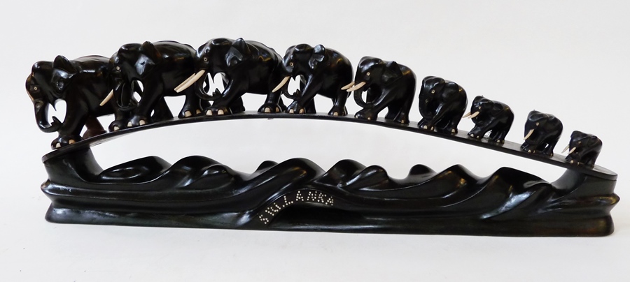 Set of graduated ebony elephants, marked "Sri Lanka"