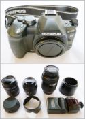 Olympus E-510 camera with lenses in fitted case