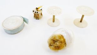 Three mother-of-pearl carved and decorated thread holders, shell pin cushion and a mother-of-pearl