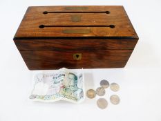 Quantity of British and foreign coins of the world, together with a few banknotes in a ballot box