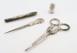 Nineteenth century lady's silver-coloured metal sewing kit, all ornately decorated with foliate