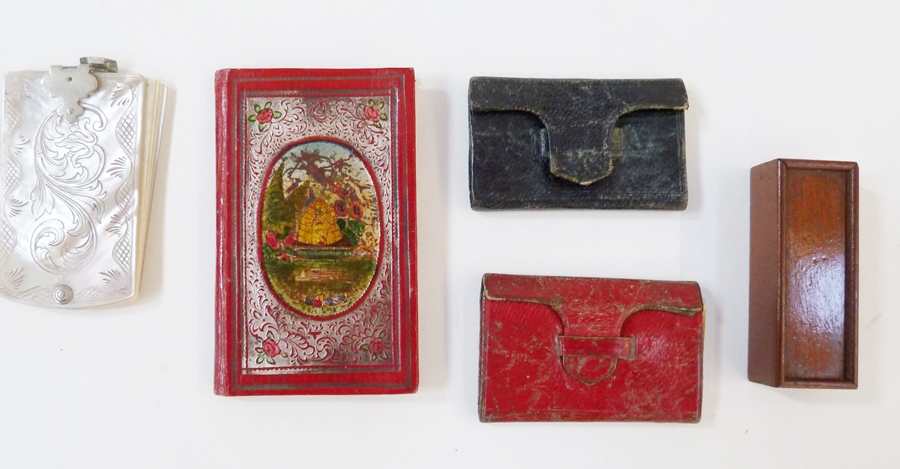 Gilt embossed needle case, set of miniature bone dominoes in small mahogany box, two almanacs and