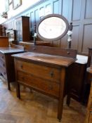 Early twentieth century oak mirror back dressing chest of two long drawers, on square legs with