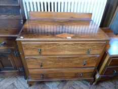 20th century walnut veneered bedroom set, comprising:- chest of three long drawers with drop