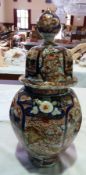 Early twentieth century Japanese vase, decorated in the Imari pattern, with lid, round finial to