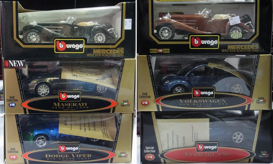 A 1/20 scale Burago diecast model Mercedes Benz 500, Roadster 1936 and another, a Maserati 320 GT, a