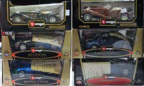 A 1/20 scale Burago diecast model Mercedes Benz 500, Roadster 1936 and another, a Maserati 320 GT, a