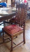 A Harlequin set of Jacobean style oak dining chairs, with foliate carved crest rails, splat back,