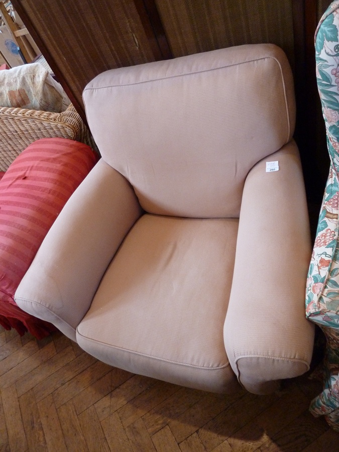 Early twentieth century armchair on square tapering supports and brass castors