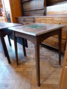 An Edwardian oak square top side table, inset with green glazed tiles on square tapering legs, width