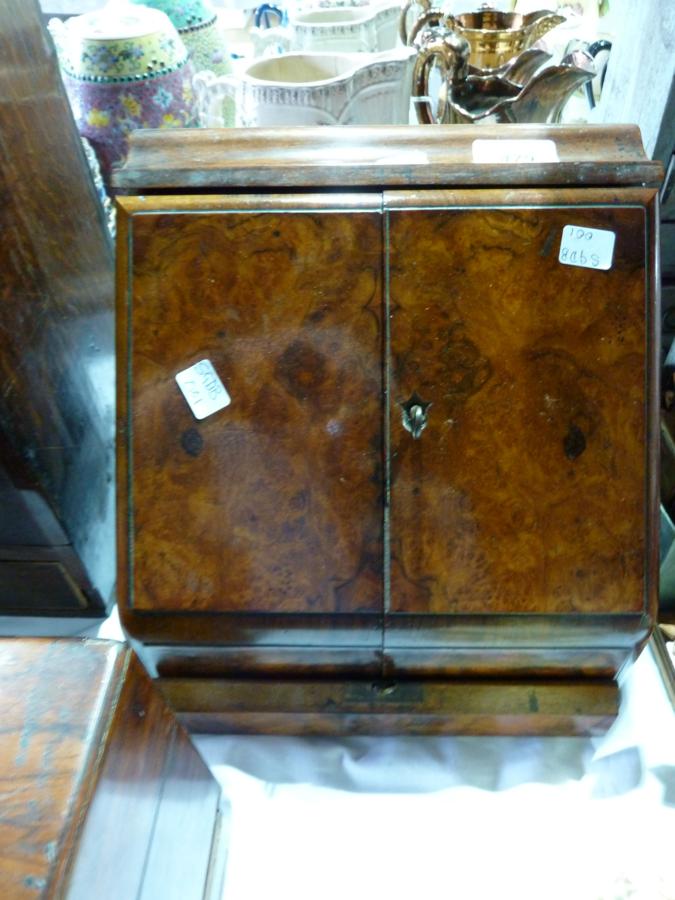 Victorian burr walnut stationery rack, with lift-up pen rest opening to reveal perpetual calendar