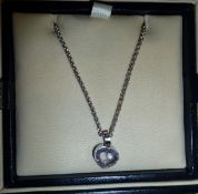 18ct white gold Chopard heart-shaped pendant, with floating diamond, and the matching chain