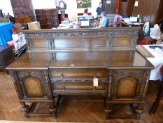 Late Victorian Renaissance style oak sideboard, by Maple and Co, with carved foliate and split