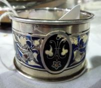 A Russian silver coloured metal and cloisonne napkin ring, with floral decoration