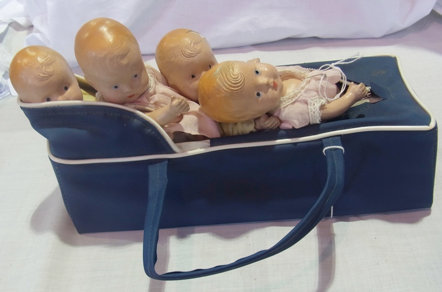 Four composition baby dolls, 18 cm high (4)
