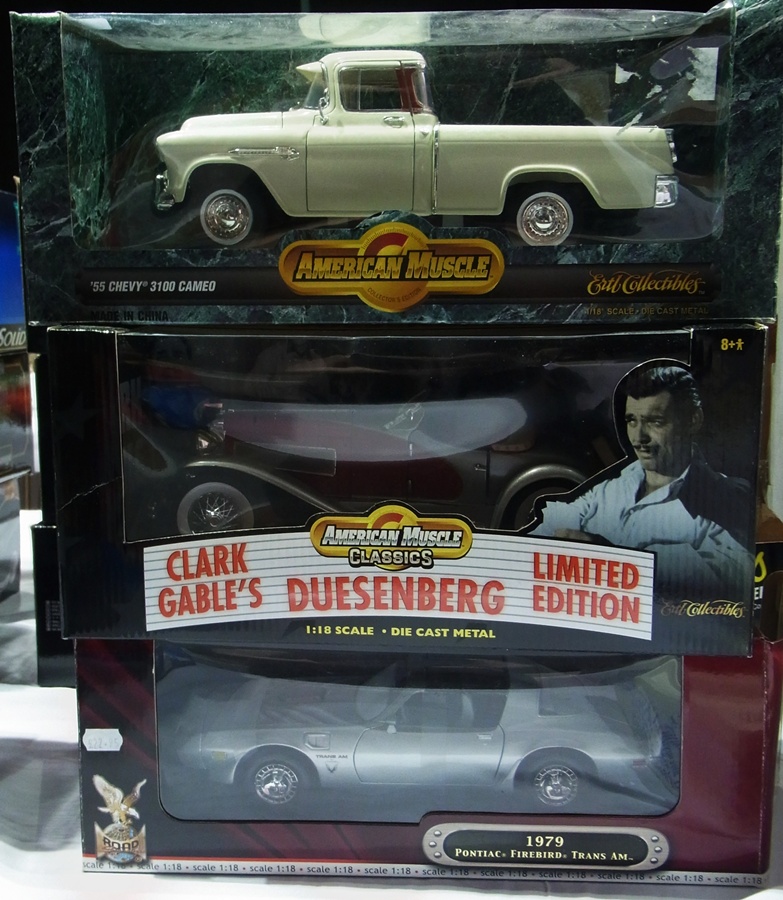 A 1/18 scale diecast model of a 1955 Chevy, Clark Gables Dusenberg and a 1979 Pontiac Firebird Trans