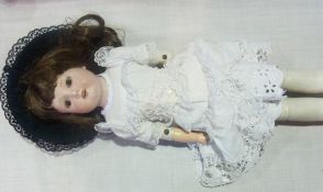 Armand Marseilles bisque headed doll with fixed brown eyes, open mouth, simulated pearl and beaded