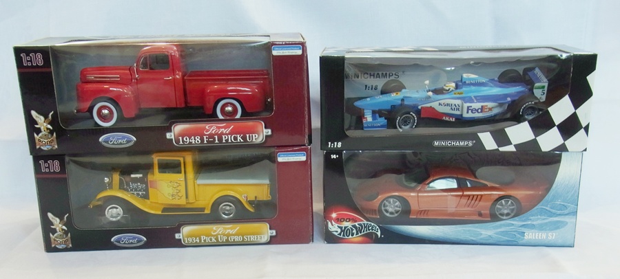 A 1/18 scale diecast Hotwheels model of a Saleen S7, a Ford 1934 Pickup (Pro Street), a Mini
