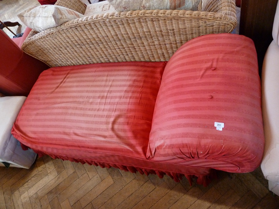 Victorian chaise, with scroll end, on leaf carved tapering and beaded supports, with brass castors