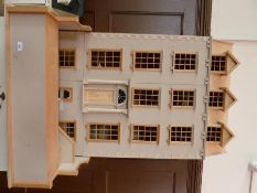 Large reproduction Georgian style dolls house, five storeys with front pillars, hinged opening front
