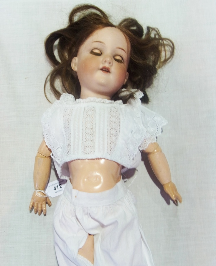 Bisque headed doll with sleeping blue eyes, open mouth, trembling tongue, marks "Koppelsdorf A9M",