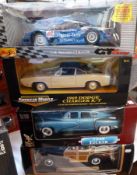 A 1/18 diecast Maisto model of a Mercedes CLK,  GTR American Muscle 1969 Dodge Charger, a Maisto