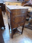 A George III mahogany wash stand, the top opening to reveal fitted interior for basin and