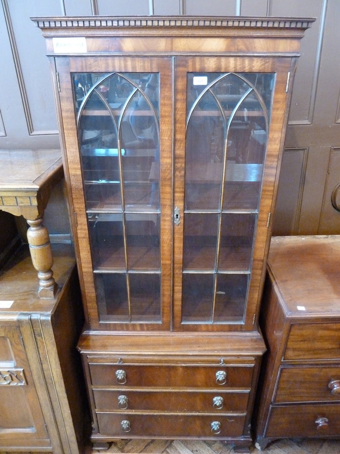 20th century mahogany small library bookcase, with dentil cornice, astragal glazed doors enclosing