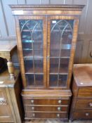 20th century mahogany small library bookcase, with dentil cornice, astragal glazed doors enclosing