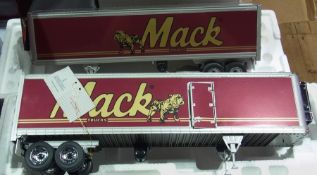 A 1/32 scale Franklin Mint Mack Tractor with trailers (2) a 1929 Rolls Royce Phantom and a 1961