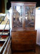 A nineteenth century mahogany glazed secretaire bookcase, the astragal glazed upper section