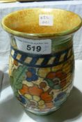 A Crown Ducal Ware tubelined baluster shaped vase designed by Charlotte Rhead, with wide band of